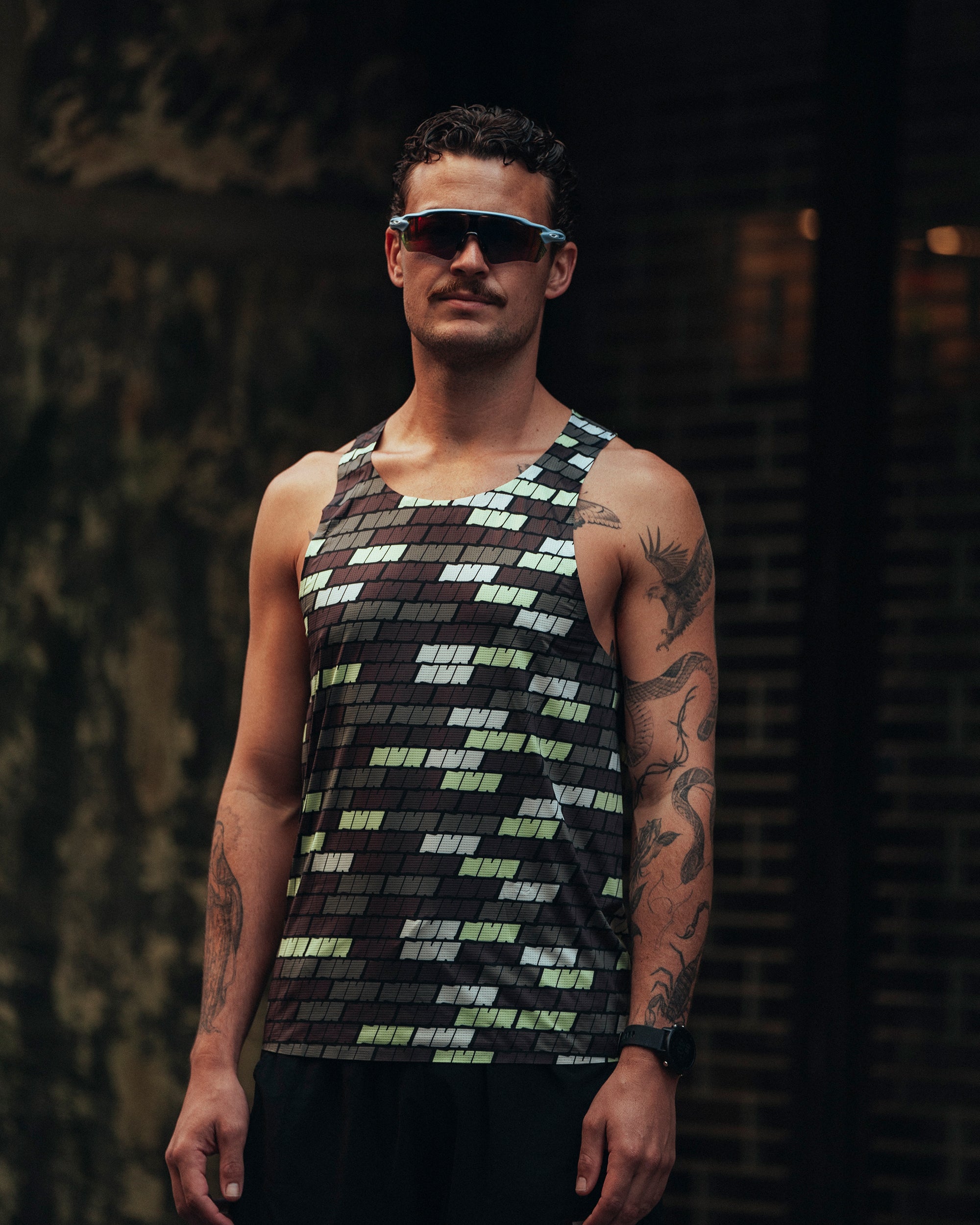 Bricks Singlet worn by male runner – lightweight athletic singlet for running