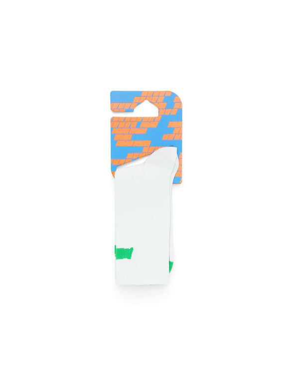 White Race Sock folded neatly displaying signature intarsia Never branding